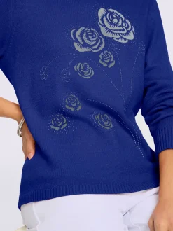 Pull encolure ronde motifs floraux et pierres brillantes
