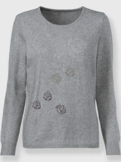Pull encolure ronde motifs floraux et pierres brillantes