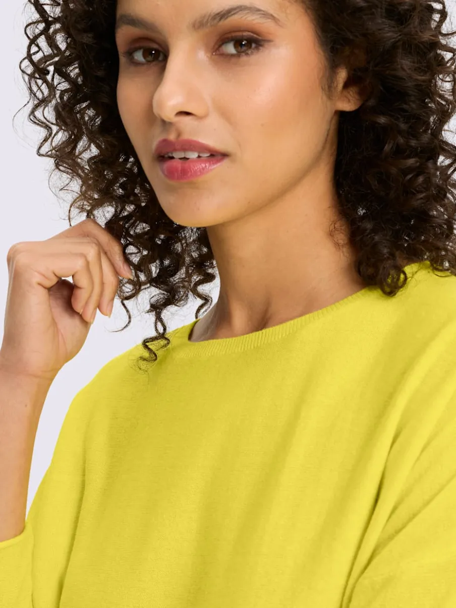 Pull en coton ample à encolure ronde et manches trois quarts