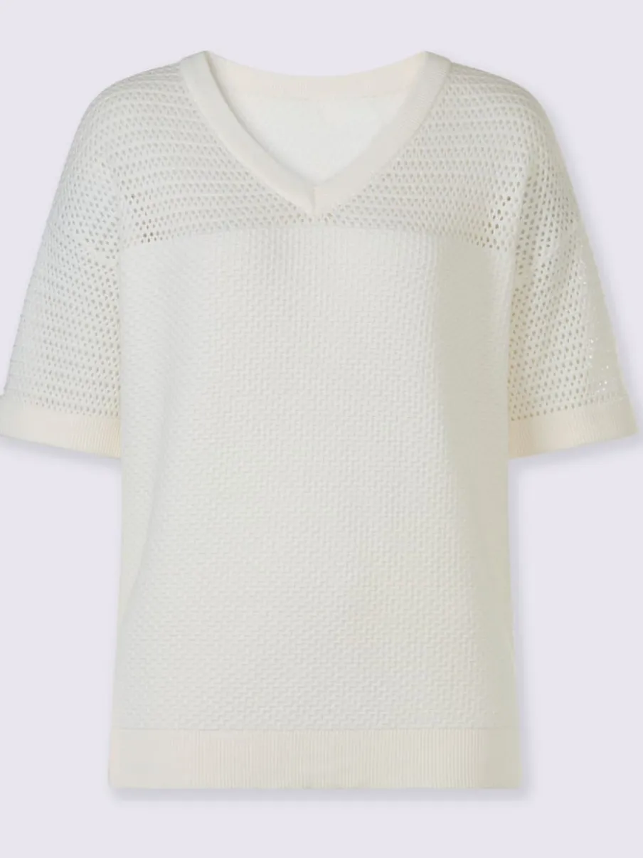 Pull en coton léger col en V avec ajourés.