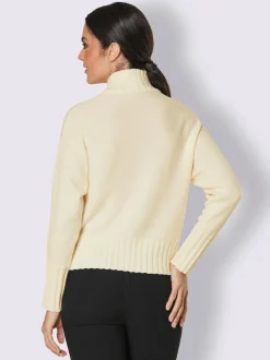 Pull en laine mérinos avec col montant et manches chauve-souris