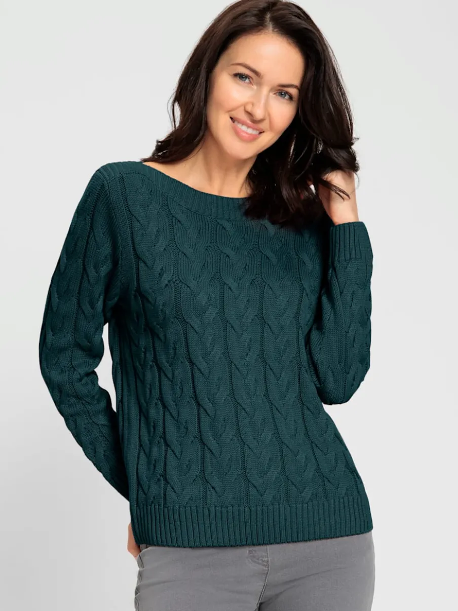 Pull en maille torsadée avec encolure en U côtelée