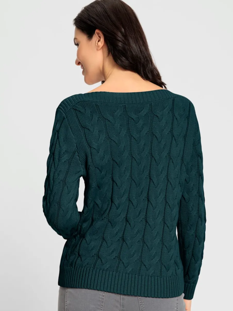 Pull en maille torsadée avec encolure en U côtelée