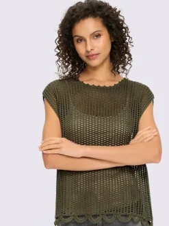 Pull en tricot ajouré avec encolure ronde et bord ondulé