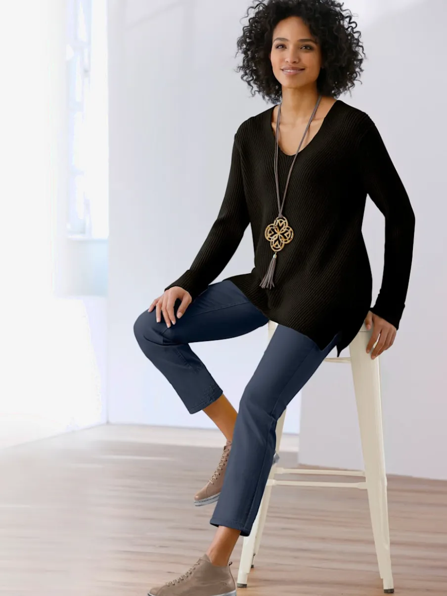 Pull en tricot avec col en V et manches longues
