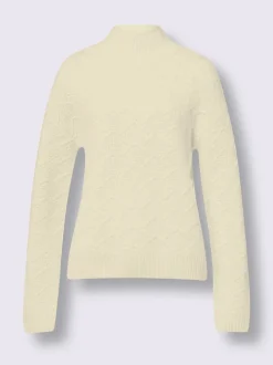Pull en tricot avec col montant et motifs doux