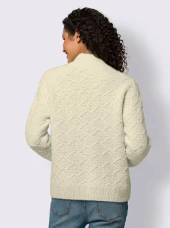 Pull en tricot avec col montant et motifs doux