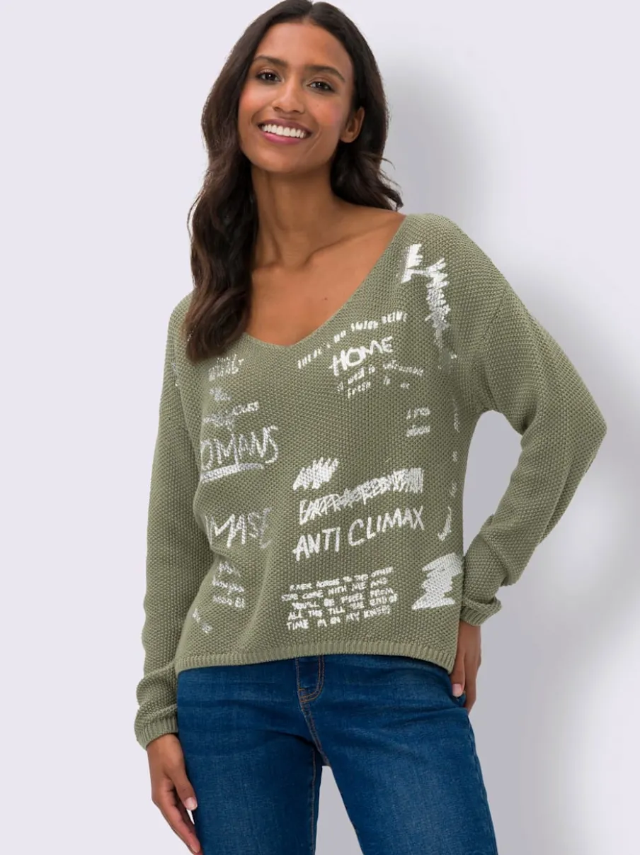 Pull en tricot avec encolure en V et inscriptions