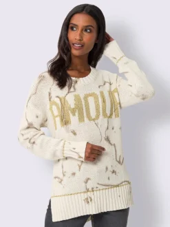 Pull en tricot avec imprimé lumineux et fentes latérales