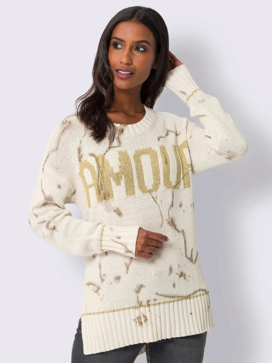 Pull en tricot avec imprimé lumineux et fentes latérales
