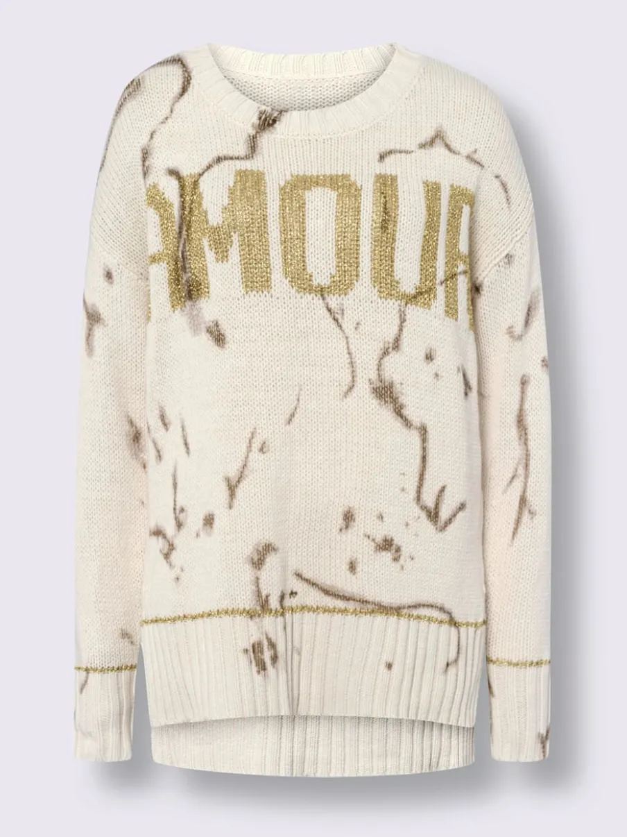 Pull en tricot avec imprimé lumineux et fentes latérales