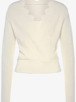 Pull en tricot à bord ondulé avec manches longues et tricot doux