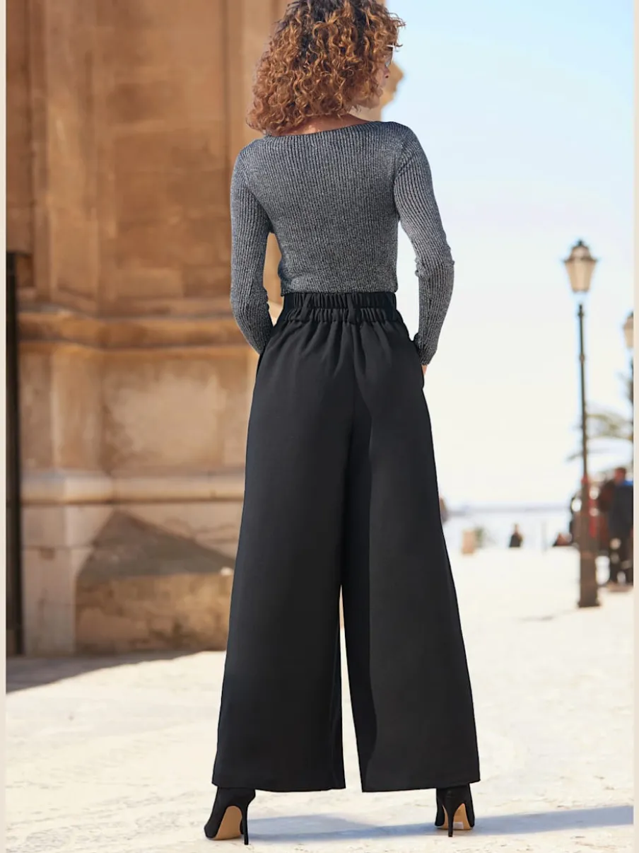 Pull en tricot brillant à encolure ronde avec manches longues