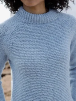 Pull en tricot col montant à manches trois-quarts et bords-côtes