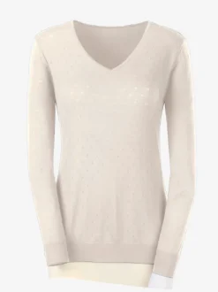 Pull en tricot doux col en V motif ajouré.
