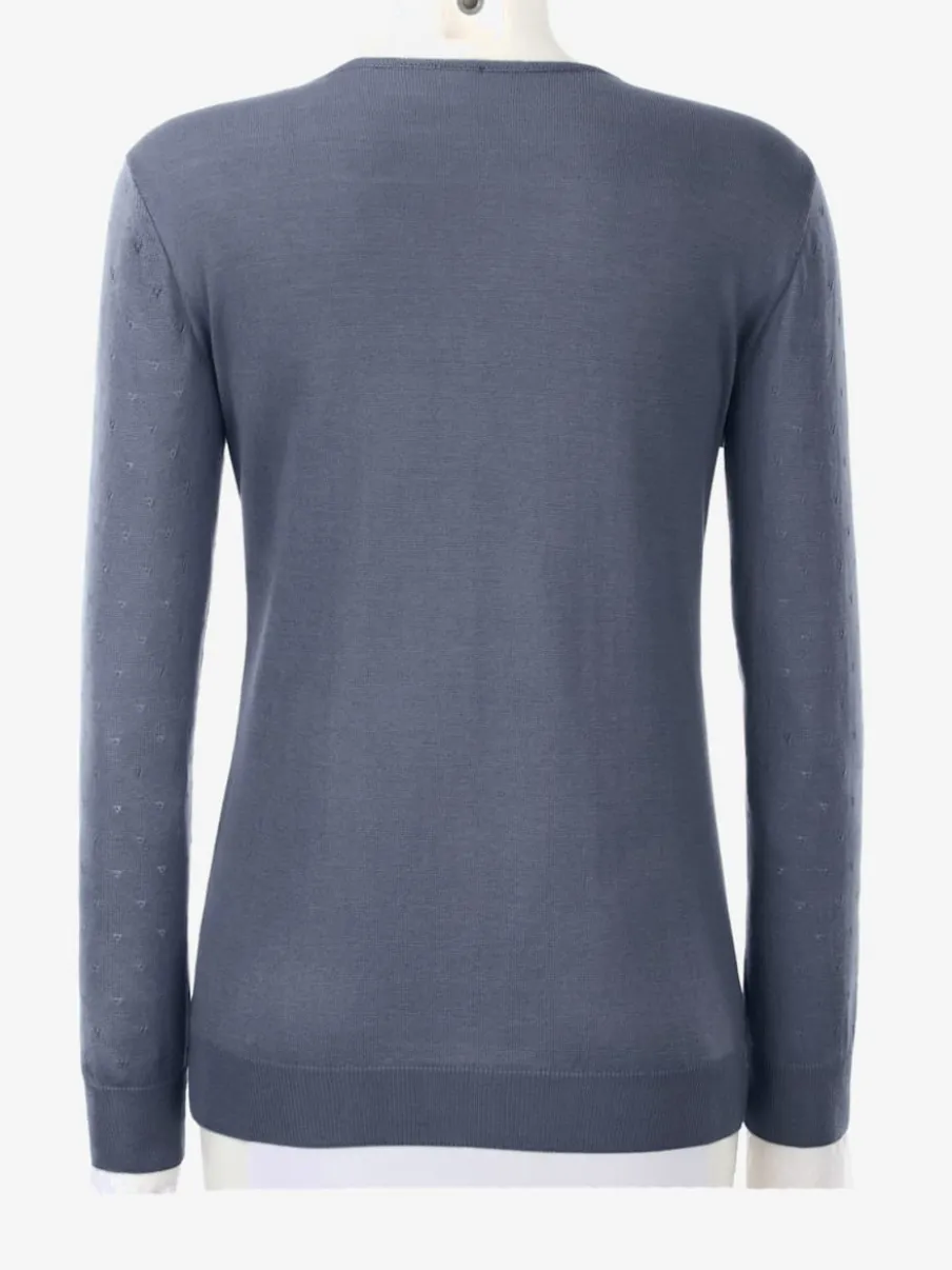Pull en tricot doux col en V motif ajouré.
