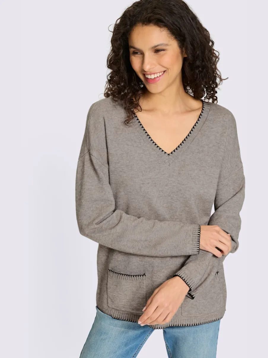 Pull en tricot doux à encolure en V et poches