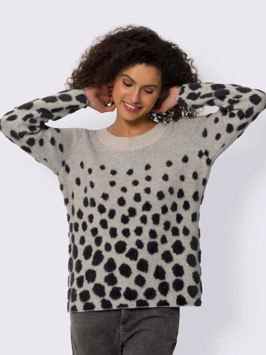 Pull en tricot doux à pois avec manches longues