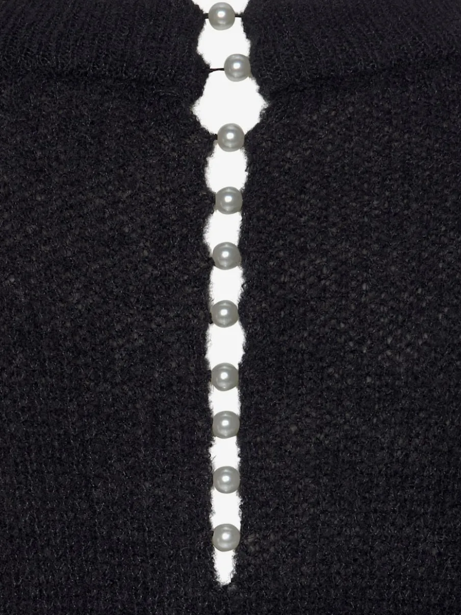 Pull en tricot à encolure en V avec perles et fente au dos