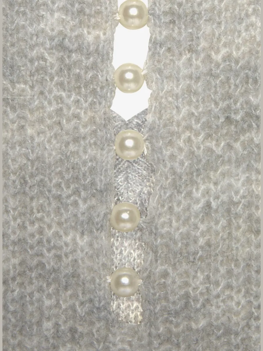 Pull en tricot à encolure en V avec perles et fente au dos