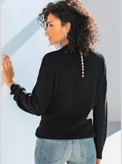 Pull en tricot à encolure en V avec perles et fente au dos
