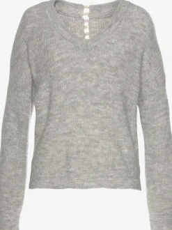 Pull en tricot à encolure en V avec perles et fente au dos