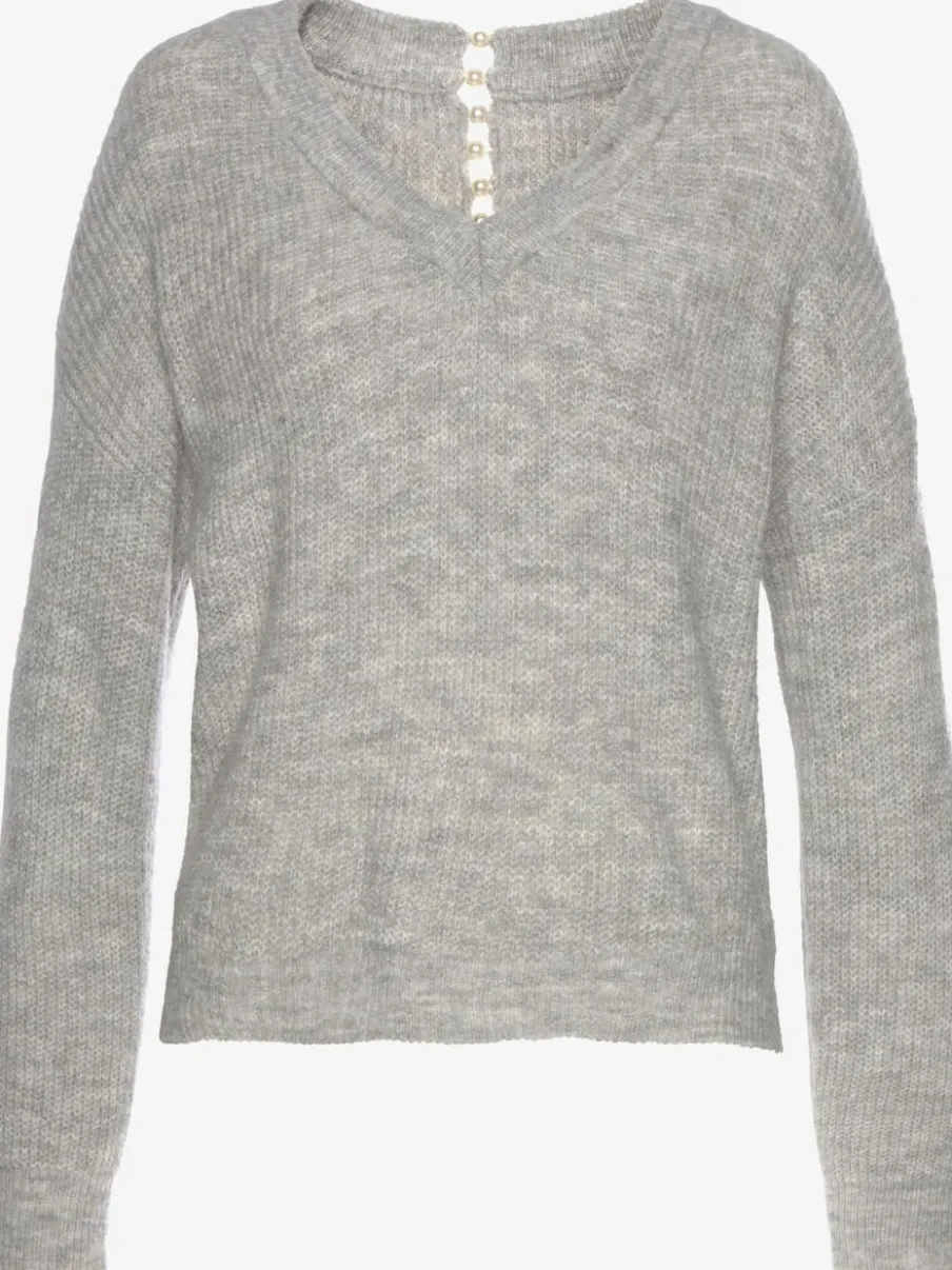 Pull en tricot à encolure en V avec perles et fente au dos