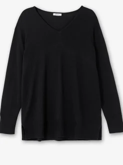 Pull en tricot fentes latérales