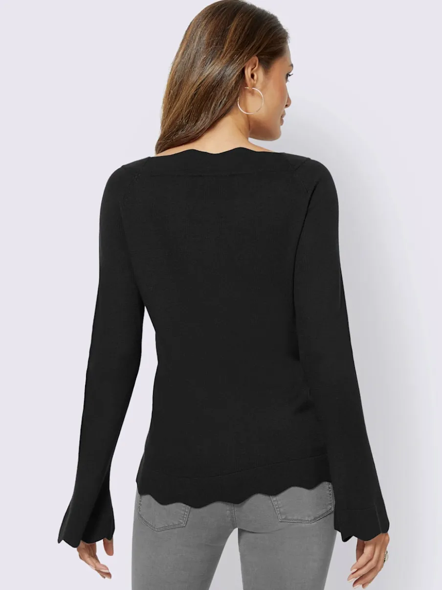 Pull en tricot fin avec encolure en U et ourlet