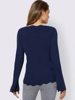 Pull en tricot fin avec encolure en U et ourlet