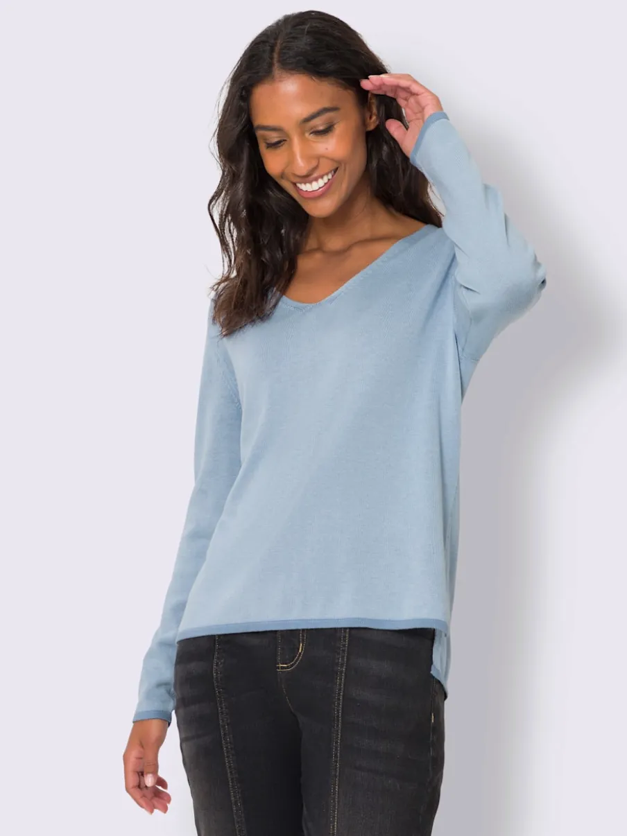 Pull en tricot fin avec encolure en V et manches longues