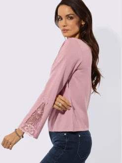 Pull en tricot fin avec encolure V et manches évasées ornées de dentelle