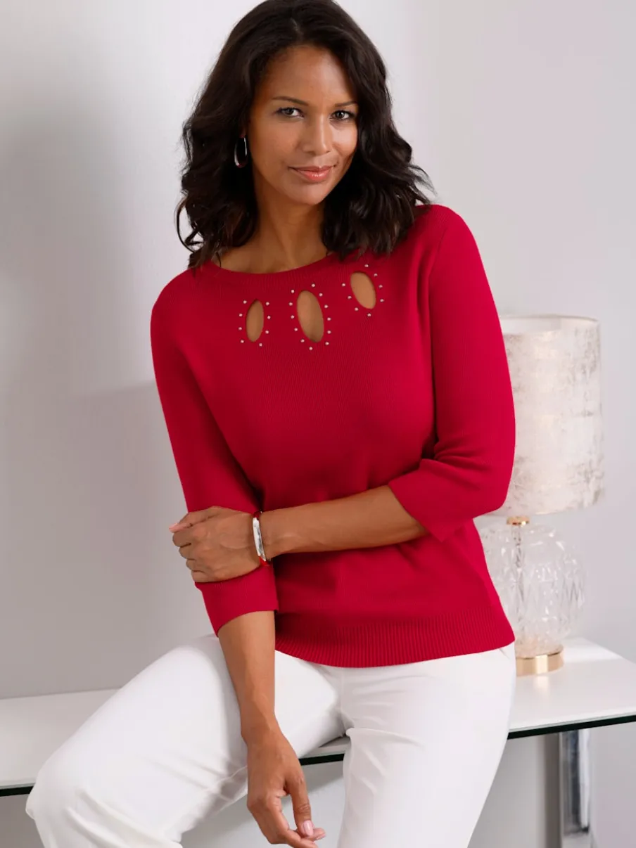 Pull en tricot fin avec encolure U et découpes