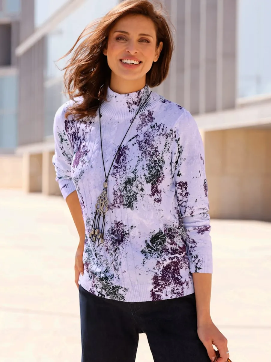 Pull en tricot fin à col montant et motif torsadé