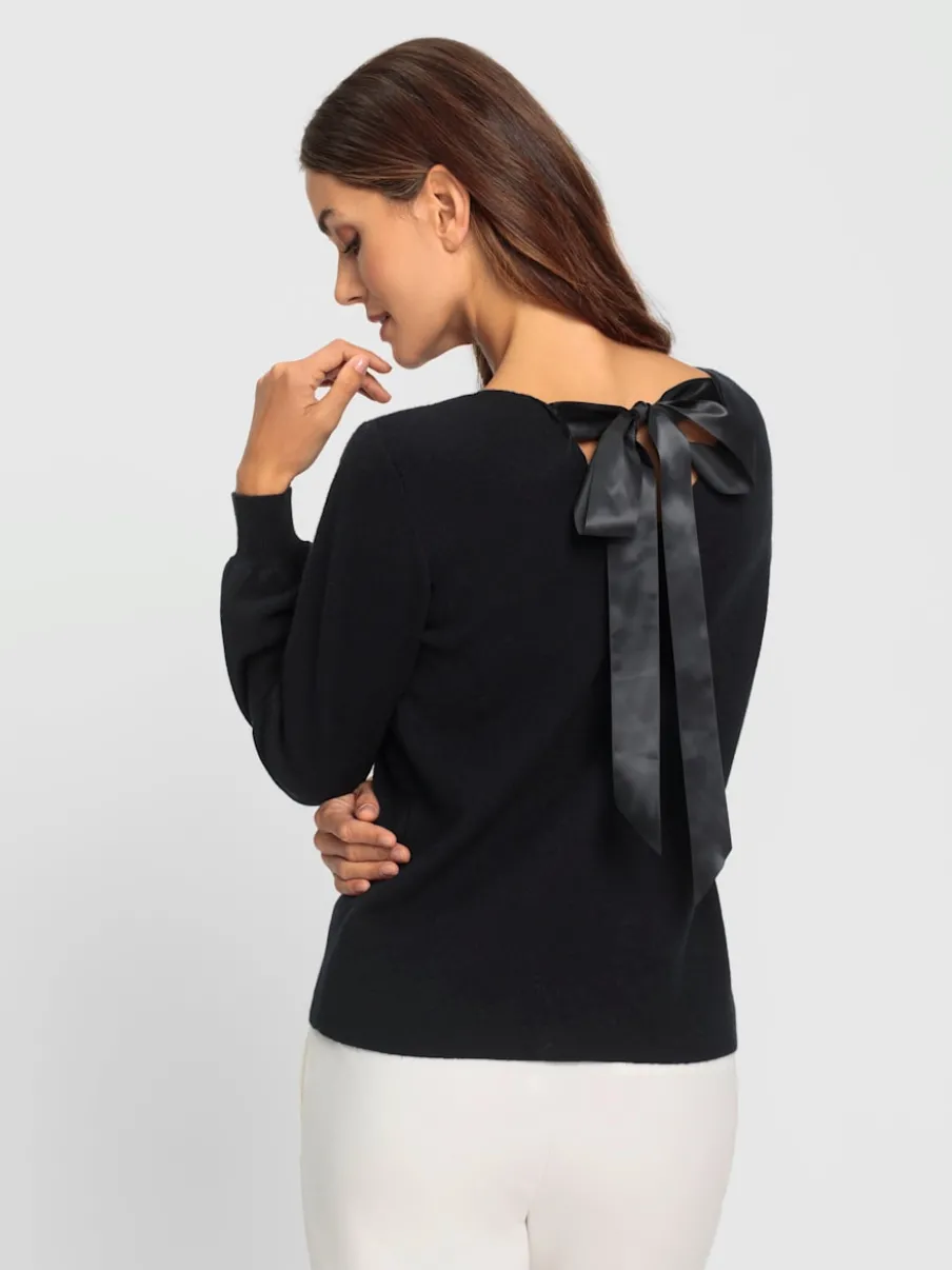 Pull en tricot fin encolure en V au dos