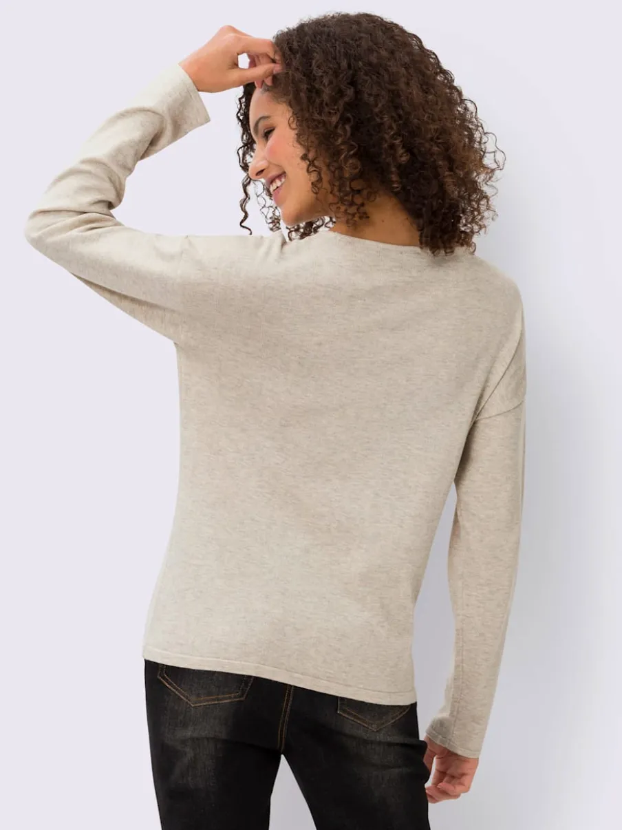 Pull en tricot fin motif cœur et léger mancheron