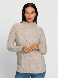 Pull en tricot motif tricoté col montant finitions côtelées