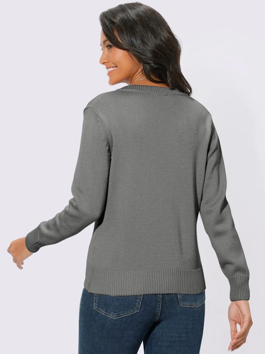 Pull femme col en v classique et finition côtelée