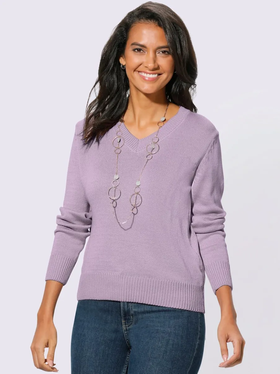 Pull femme col en v classique et finition côtelée