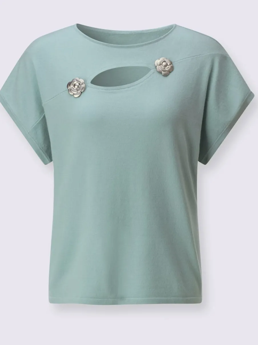 Pull à fleurs et découpes avec encolure en U