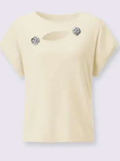 Pull à fleurs et découpes avec encolure en U