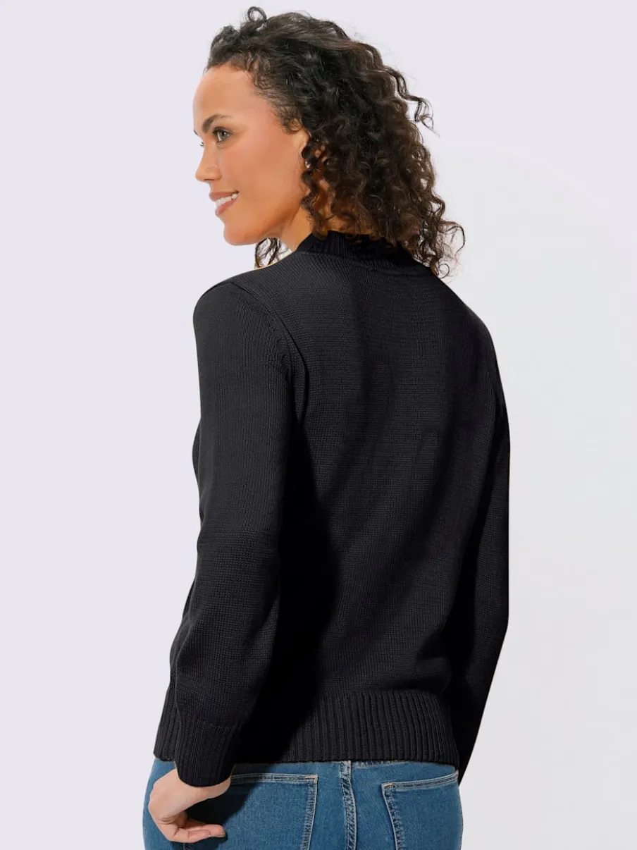 Pull féminin col tortue manches longues finitions côtelées