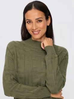 Pull jacquard motif tricoté col montant manches longues