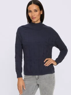 Pull jacquard motif tricoté col montant manches longues
