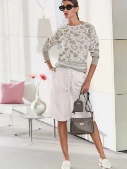 Pull jacquard original en fil brillant à manches longues