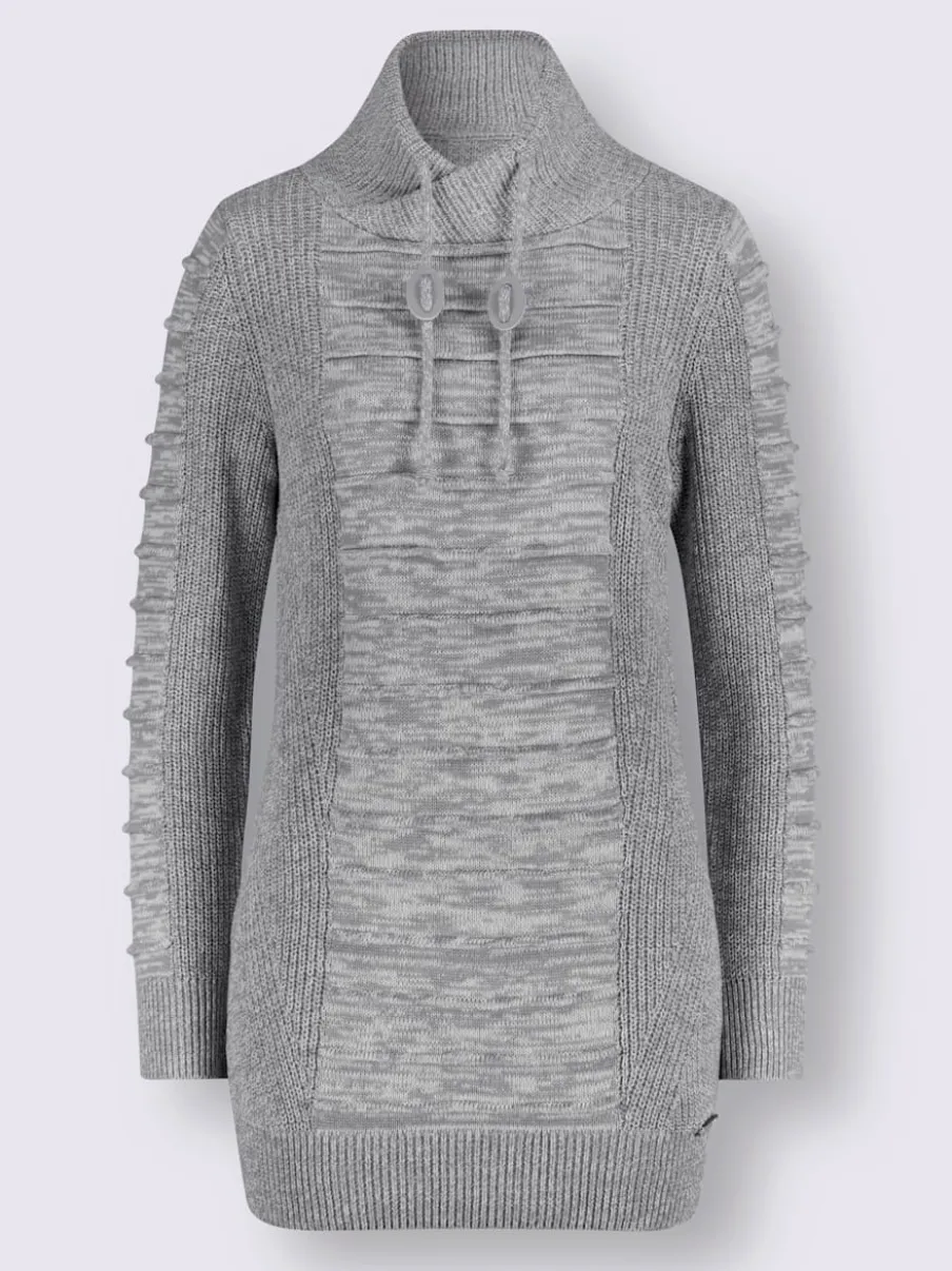 Pull long col roulé manches longues motif structuré moderne