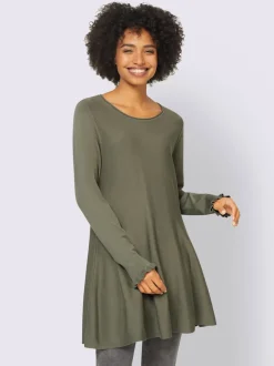 Pull long légèrement évasé avec bords roulés et volants