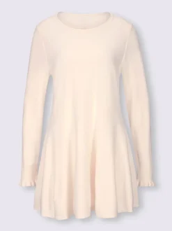 Pull long légèrement évasé avec bords roulés et volants