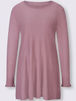 Pull long légèrement évasé avec bords roulés et volants