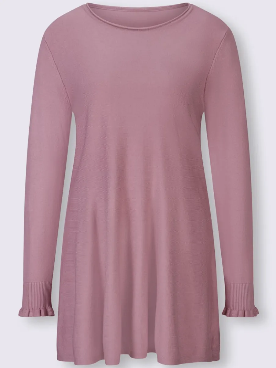 Pull long légèrement évasé avec bords roulés et volants
